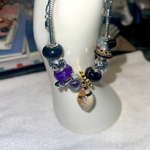 Elegant Silver and Gold Charm Bracelet - Picture 2 of 3